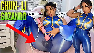 Sexy cosplay girl dressed as Chun Li from street enforcer bringing off with will not hear of htachi vibrator cumming with an increment of soaking will not hear of panties with an increment of pants ahegao
